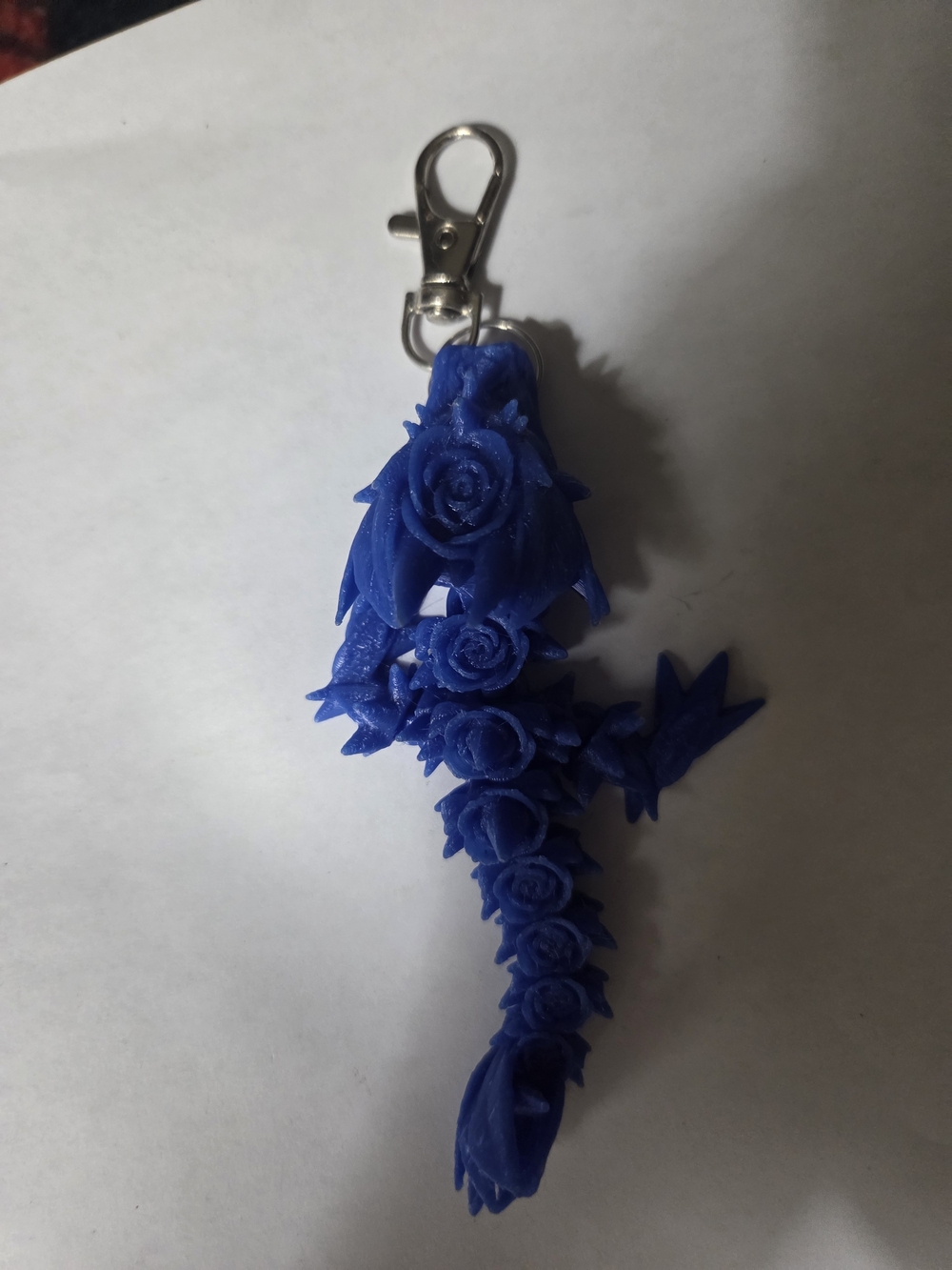 Blue Dragon made of roses. 4 5 inch keychain